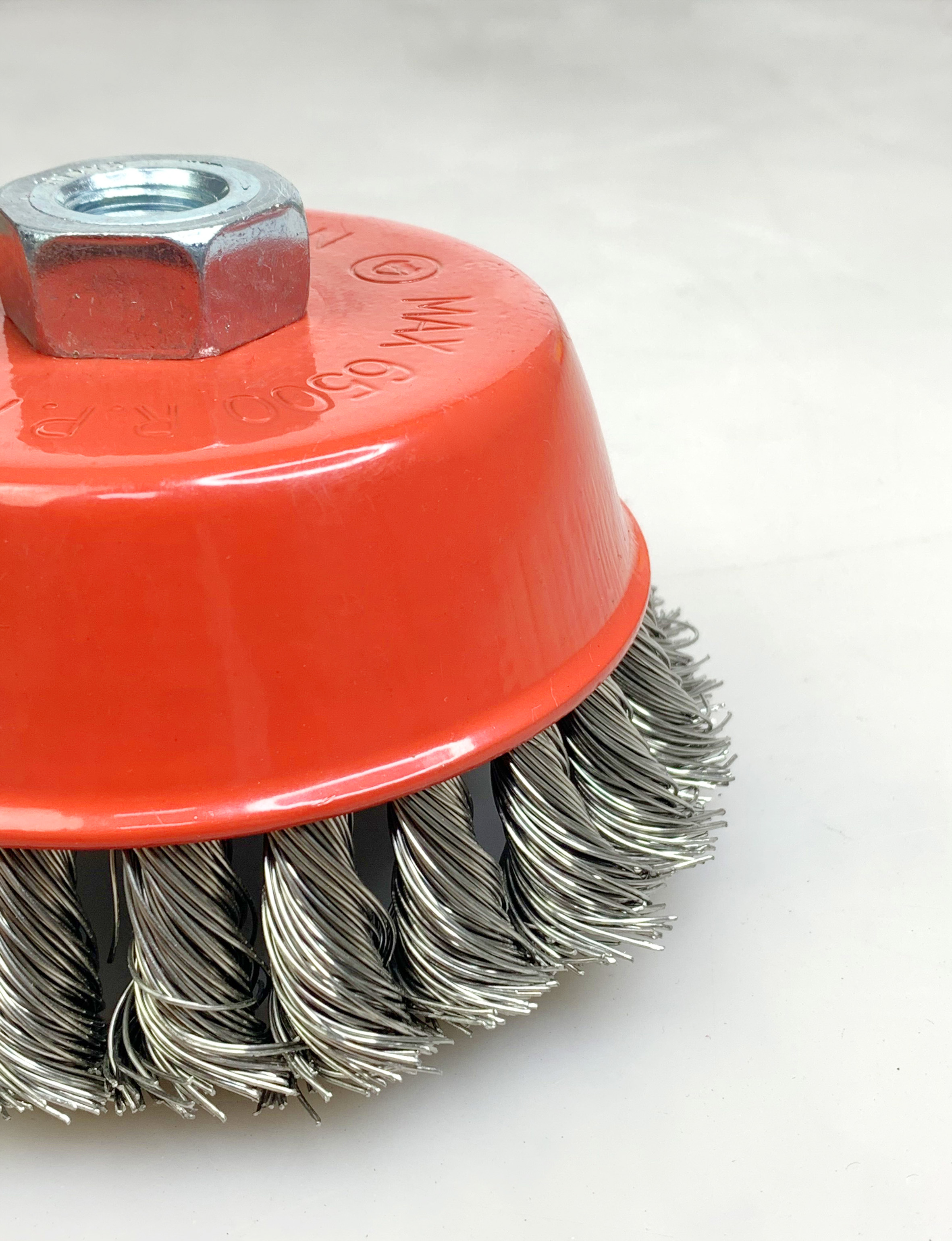 The difference between  twisted wire  brush and crimped wire brush
