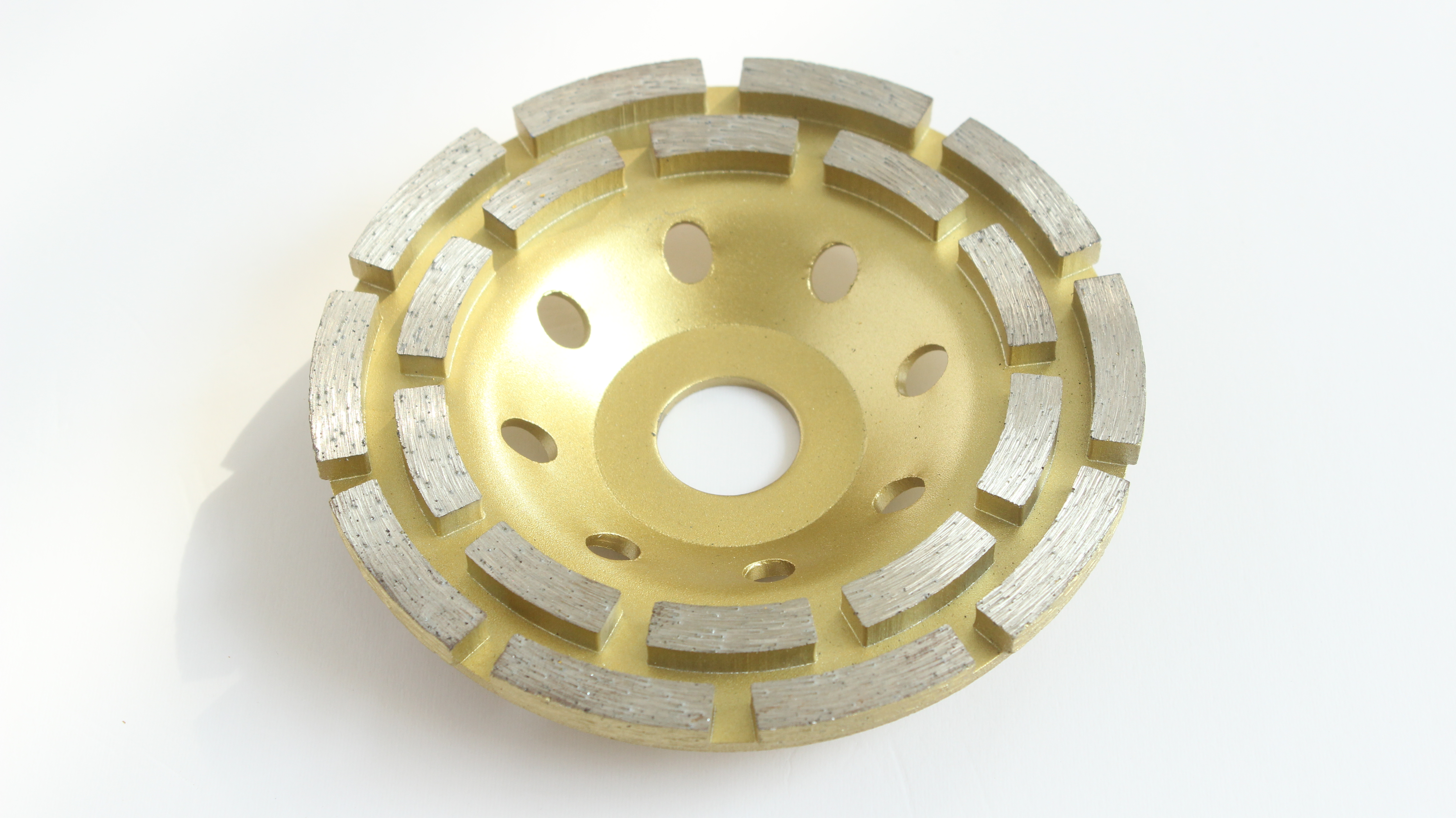 What is the main safety risk associated with abrasive wheels?