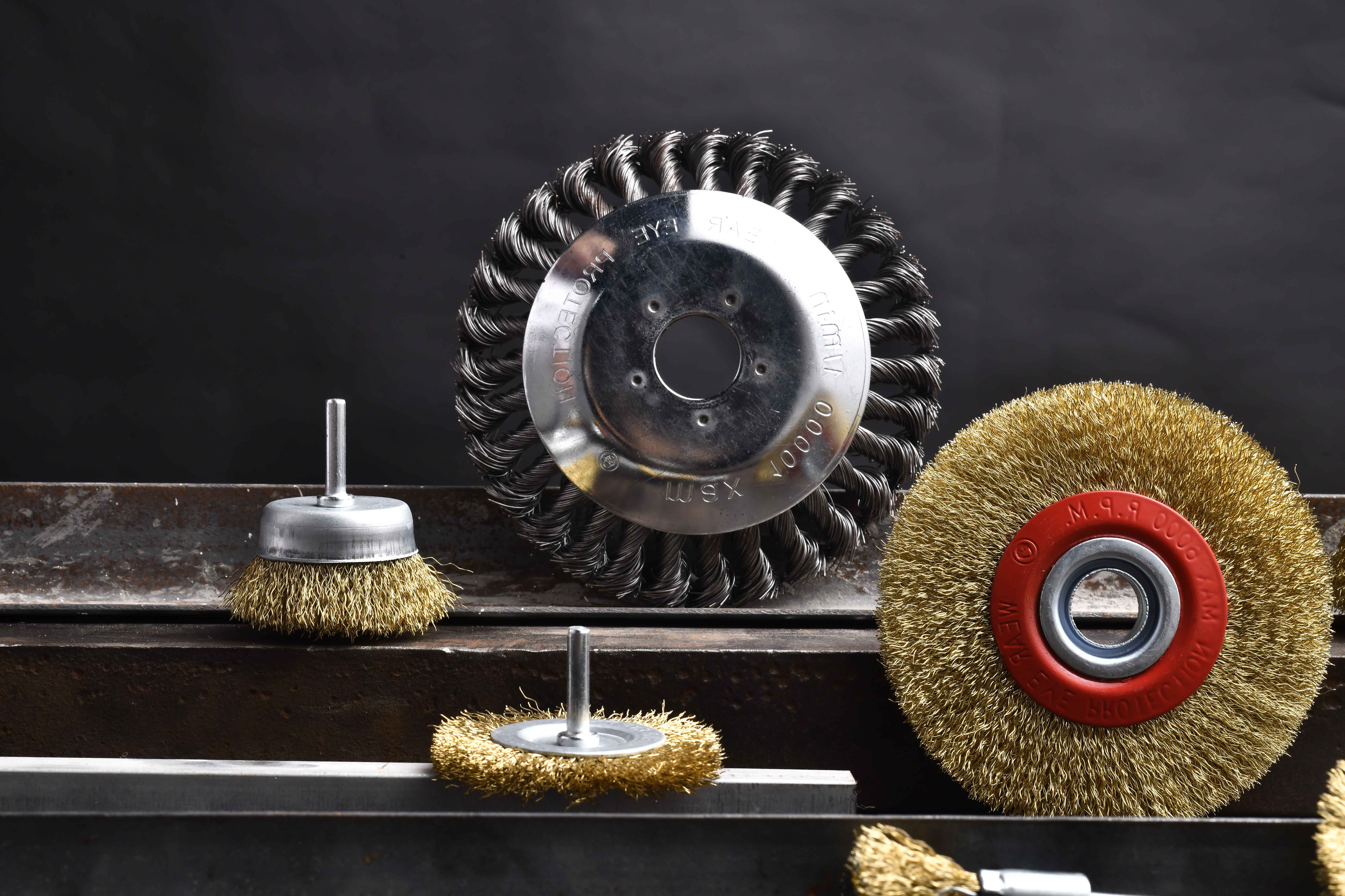 What is a wire brush used for in painting?